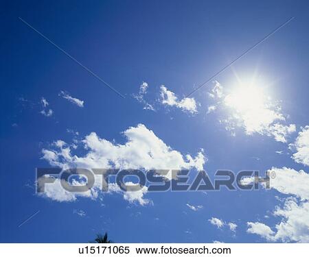 Stock Photography - "Sun And Cloud, Okinawa, Japan". Fotosearch