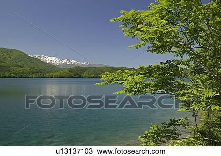 Stock Image - "Lake And Mountain, Nagano, Japan". Fotosearch
