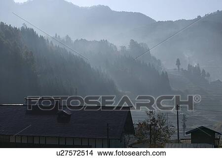 "Mountains And Roofs In Mist, Nagano, Japan" View Large Photo Image Picture - "Mountains And Roofs In Mist, Nagano, Japan". Fotosearch