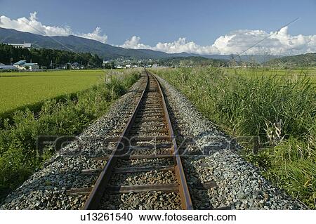"Railroad In Countryside, Nagano, Japan" View Large Photo Image Stock Image - "Railroad In Countryside, Nagano, Japan". Fotosearch
