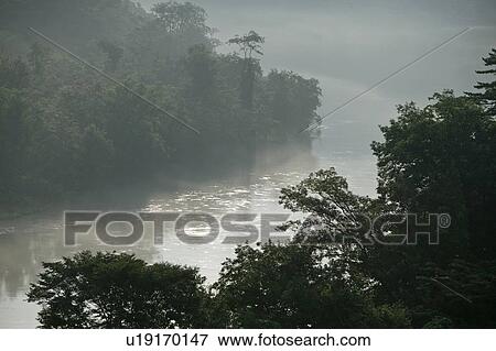 Stock Photo - "River In Mist, Nagano, Japan". Fotosearch