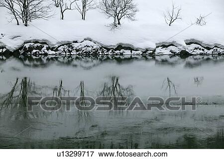 Stock Photo - "Snowscape Of River, Nagano, Japan". Fotosearch
