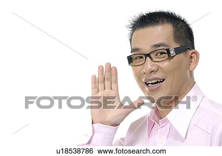 Stock Photograph - Businessman showing his palm. Fotosearch