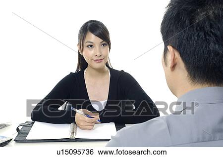 Businesswoman interviewing a candidate View Large Photo Image Stock Photograph - Businesswoman interviewing a candidate. Fotosearch