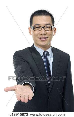 Portrait of a businessman showing his palm View Large Photo Image Stock Image - Portrait of a businessman showing his palm. Fotosearch