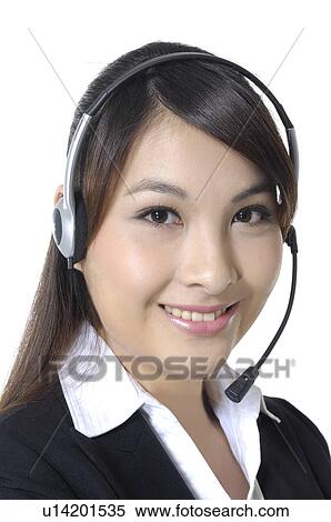 Portrait of a female customer care executive smiling View Large Photo Image Stock Photography - Portrait of a female customer care executive smiling. Fotosearch
