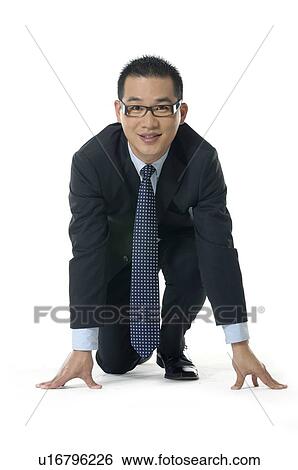 Stock Photograph - Businessman carrying a hand bag. Fotosearch