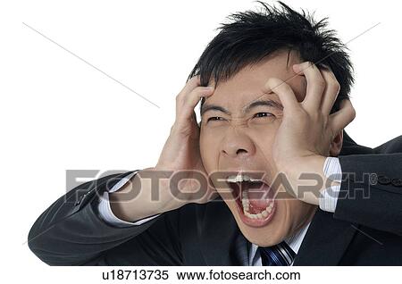 Businessman Suppressing his face and shouting View Large Photo Image Stock Photography - Businessman Suppressing his face and shouting. Fotosearch