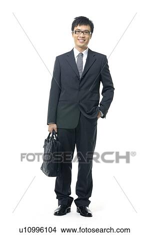 Picture - Businessman carrying a hand bag. Fotosearch