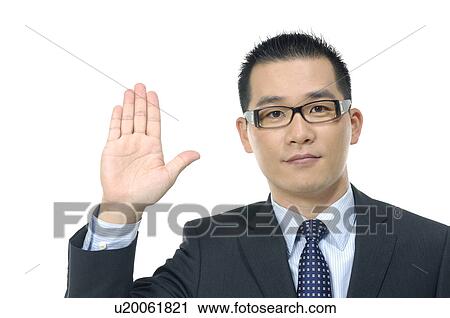 Businessman showing stop sign View Large Photo Image Stock Image - Businessman showing stop sign. Fotosearch