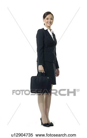 Stock Photography - Businesswoman carrying a hand bag. Fotosearch