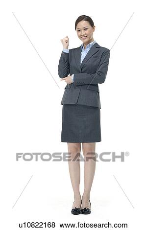 Stock Photo - Businesswoman clenching her fist. Fotosearch