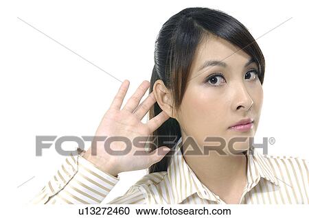 Stock Image - Businesswoman showing her palm. Fotosearch