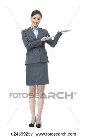 Businesswoman showing her palm View Large Photo Image Stock Photo - Businesswoman showing her palm. Fotosearch