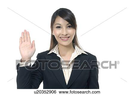 Stock Photograph - Businesswoman showing her palm. Fotosearch
