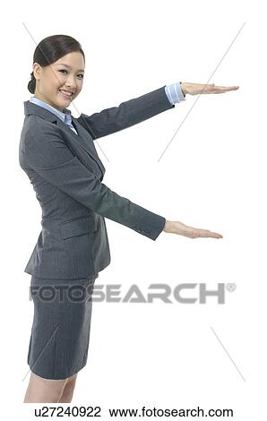Portrait of a businesswoman gesturing View Large Photo Image Stock Image - Portrait of a businesswoman gesturing. Fotosearch