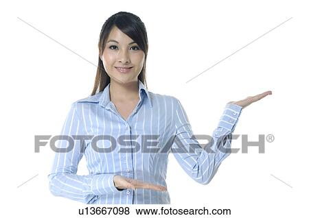 Portrait of a businesswoman gesturing View Large Photo Image Stock Photo - Portrait of a businesswoman gesturing. Fotosearch