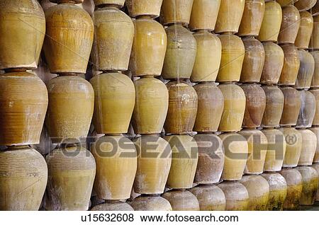 Wall made up of wine urns View Large Photo Image Stock Photo - Wall made up of wine urns. Fotosearch