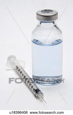 Close-up of a pill bottle and a syringe View Large Photo Image Stock Photograph - Close-up of a pill bottle and a syringe. Fotosearch