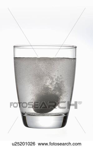 Close-up of a pill dissolving into water with bubbles View Large Photo Image Stock Photograph - Close-up of a pill dissolving into water with bubbles. Fotosearch