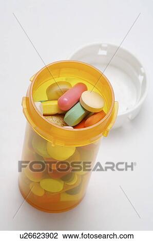 Close-up of tablets in pill bottle View Large Photo Image Stock Image - Close-up of tablets in pill bottle. Fotosearch