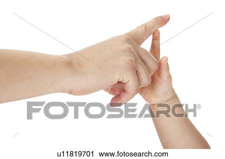 Close-up of human finger contrasting with baby finger View Large Photo Image Stock Image - Close-up of human finger contrasting with baby finger. Fotosearch
