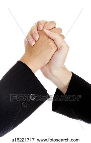 Stock Photo - Close-up of two hands holding together. Fotosearch