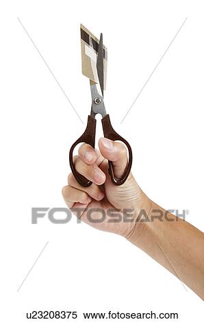 Credit Card, Human hand holding scissors to cut credit card View Large Photo Image Stock Photography - Credit Card, Human hand holding scissors to cut credit card. Fotosearch