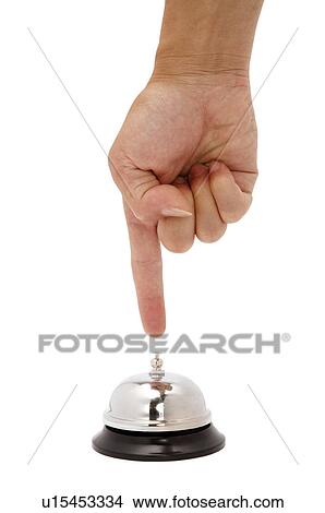 Picture - Human finger pressing service bell. Fotosearch