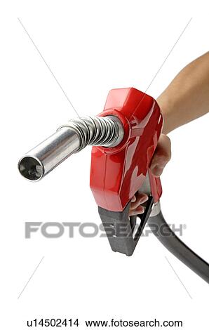 Picture - Human hand holding a fuel pump. Fotosearch