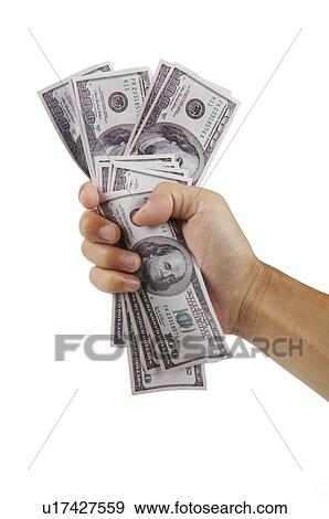 Human hand holding a handful of US paper currency View Large Photo Image Stock Photo - Human hand holding a handful of US paper currency. Fotosearch