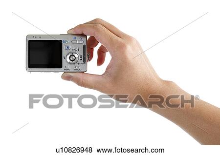 Stock Photo - Human hand holding digital camera. Fotosearch