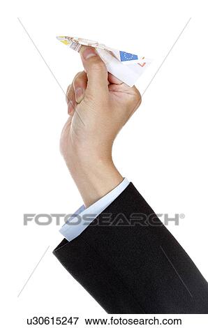 Stock Photo - Human hand playing paper airplane. Fotosearch