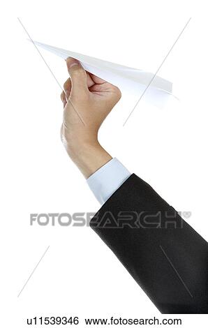 Stock Photograph - Human hand playing paper airplane. Fotosearch