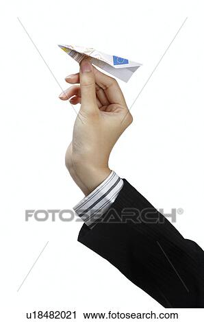 Human hand playing with paper airplane View Large Photo Image Stock Image - Human hand playing with paper airplane. Fotosearch