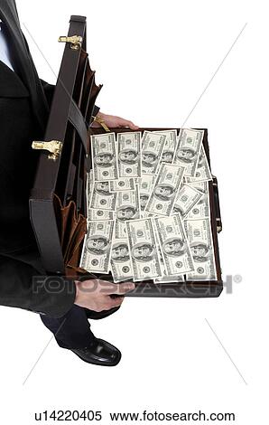Stock Photography - Human hands holding a suitcase of US paper currency. Fotosearch