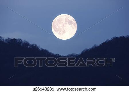 Stock Photography - Full moon in the sky. Fotosearch