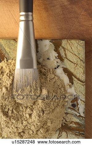 Cinamon powder and a brush View Large Photo Image Stock Photo - Cinamon powder and a brush. Fotosearch