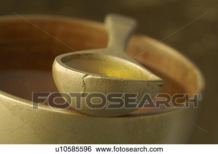 Cosmetic oil in a tub View Large Photo Image Stock Photograph - Cosmetic oil in a tub. Fotosearch