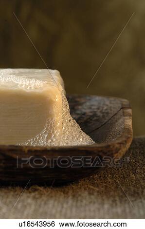Foamy soap bar in a wooden soap dish View Large Photo Image Stock Photograph - Foamy soap bar in a wooden soap dish. Fotosearch