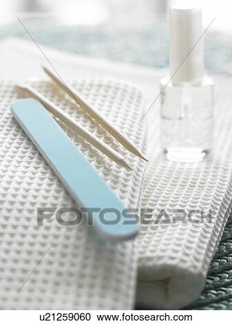 Manicure set placed on white piqué towels View Large Photo Image Stock Image - Manicure set placed on white piqué towels. Fotosearch