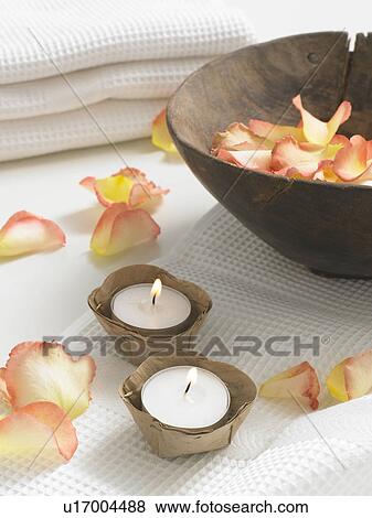 rose petals in a wooden bowl and small candles on a piqué towel View Large Photo Image Stock Photo - rose petals in a wooden bowl and small candles on a piqué towel. Fotosearch