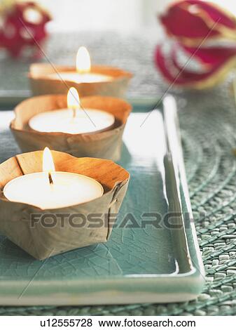 Small candles decorated on an Asian bowl View Large Photo Image Stock Photo - Small candles decorated on an Asian bowl. Fotosearch