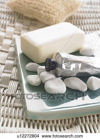 Soap and pebbles decorated in an Asian bowl View Large Photo Image Picture - Soap and pebbles decorated in an Asian bowl. Fotosearch