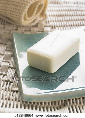 Soap decorated in an Asian bowl View Large Photo Image Picture - Soap decorated in an Asian bowl. Fotosearch
