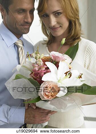 Picture - Couple with a bouquet. Fotosearch