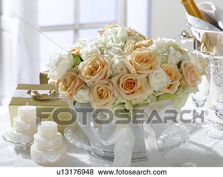 Flower arrangement of white roses in a tureen View Large Photo Image Stock Photo - Flower arrangement of white roses in a tureen. Fotosearch