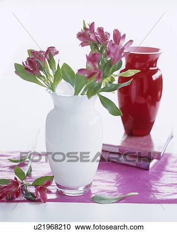 Stock Image - White glass vase with alstroemeria. Fotosearch