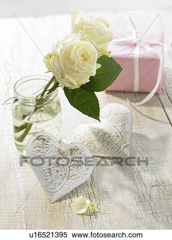 Stock Photography - White roses and white hearts. Fotosearch