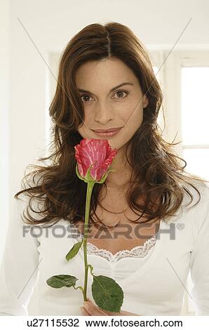 Woman with a rose View Large Photo Image Stock Image - Woman with a rose. Fotosearch